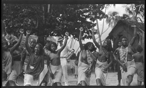 Dancing in Sikaiana, European man observing in the back