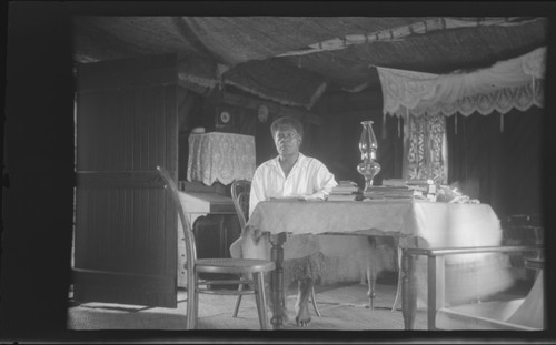 Fijian man inside of a house