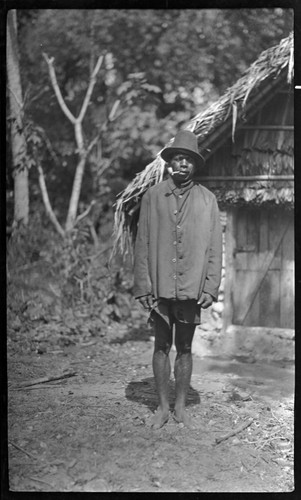 Man in felt hat and jacket, smoking