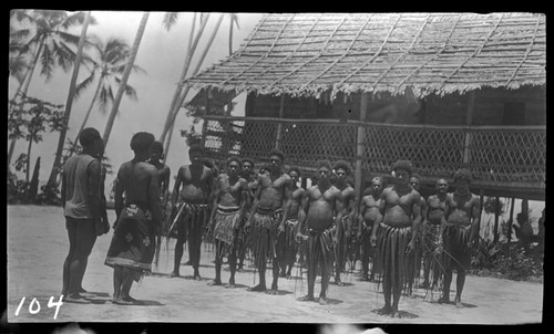 Group of men preparing to dance