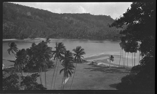 Buildings by the shore in the distance