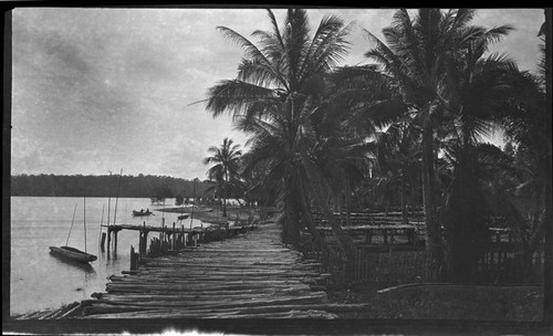 Wood walkway along water at Vaimuru (Baimuru), Kirkori Delta