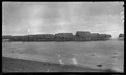 Houses on stilts over water at Tupuseleia, a Motu village