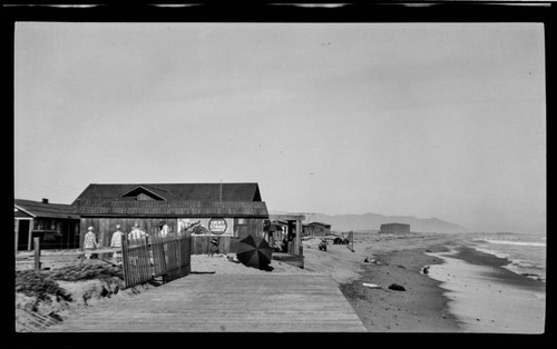 Store and houses on the beach, Pismo Beach, California