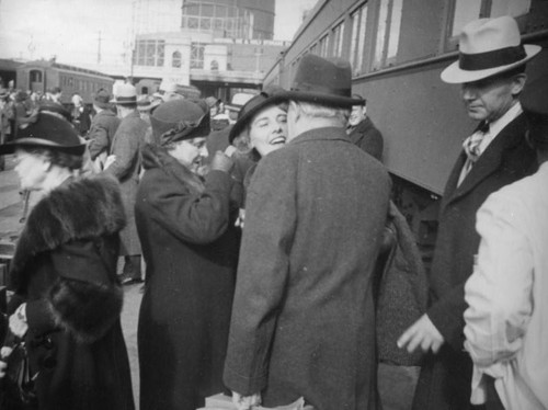 Ethel Schultheis greeting her parents at La Grande Station