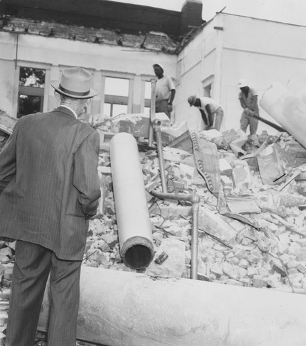 Orange Public Library Carnegie building being razed, 407 East Chapman Avenue and Grand Street, Orange, California, 1960