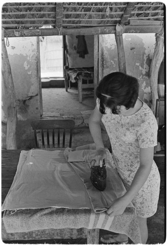 Ironing clothes at Rancho La Soledad