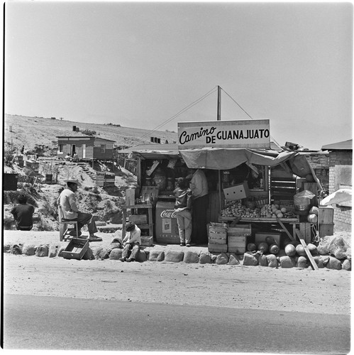 Fruit and soft drink vendors in one of the irregular settlements