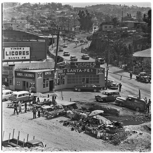 Vendors of used goods and one of many liquor stores