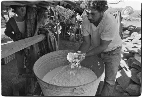 Enrique Villavicencio Murillo making cheese at Rancho El Cerro