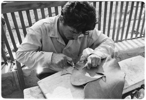 Francisco Arce working leather at Rancho San Gregorio