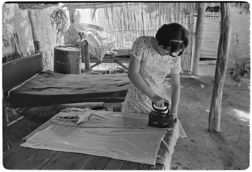 Ironing clothes at Rancho La Soledad