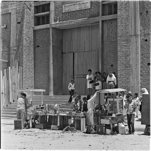 Street vendors at the corner of the Divina Providencia Church in Colonia Libertad