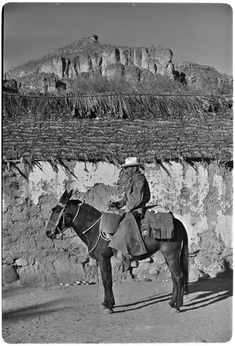 Rider in traditional riding and saddle gear at Rancho San Martín