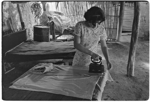 Ironing clothes at Rancho La Soledad