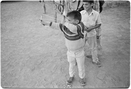 Inocencio ""Chencho"" Lopez, right, and Martín ""Pule"" Lopez with slingshots at Rancho Carrizito