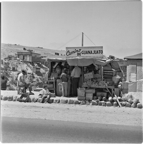 Fruit and soft drink vendors in one of the irregular settlements