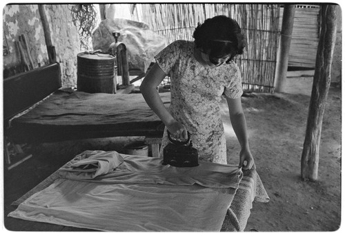 Ironing clothes at Rancho La Soledad