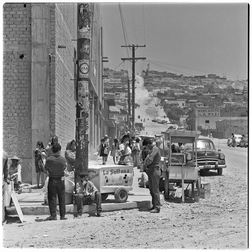 Corner of the Divina Providencia Church in Colonia Libertad with street venders