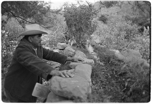 Loreto Arce working in his garden at Rancho San Gregorio