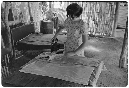 Ironing clothes at Rancho La Soledad