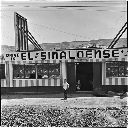 Children at the door of Drive In "El Sinaloense"