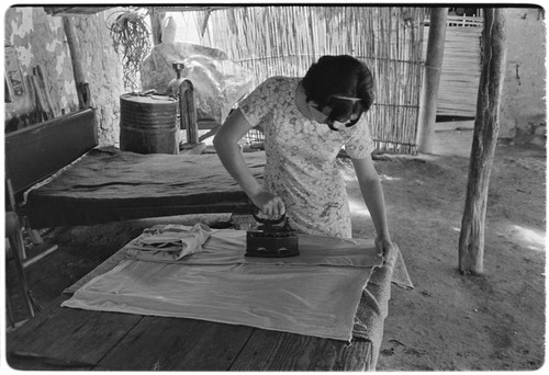 Ironing clothes at Rancho La Soledad