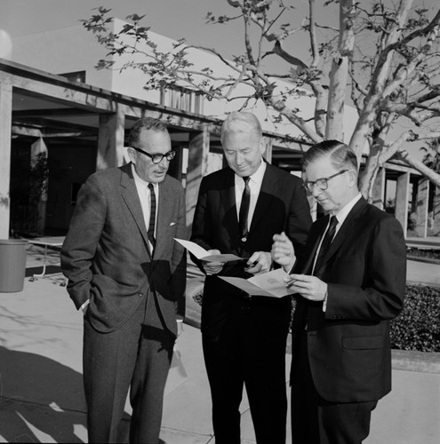 SIO Director William A. Nierenberg, UCSD Chancellor John S. Galbraith, and Charles J. Hitch (President of University of California from 1967-1975), February 8, 1968, at a reception following "The Ocean 1968 - a New World" Symposium