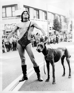 Man with dog at the Los Angeles pride parade