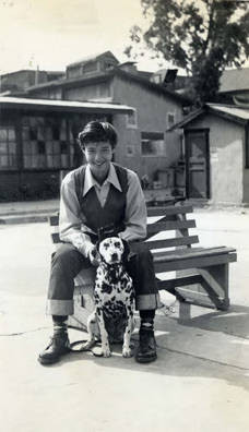 Young boy with dalmation dog