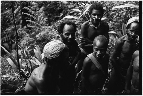 Tuguma carriers, some with barkcloth caps