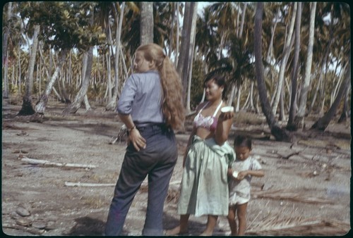 Ann Rappaport with local Chinese woman and child, at ti'i site, Maatia, Moorea