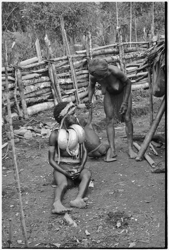 Bride price ritual: bride wearing shell valuables