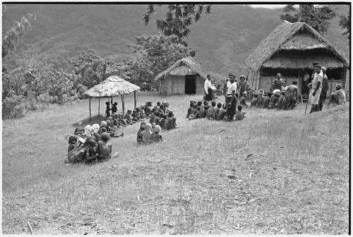 Church service in Tsembaga: local people gather with Anglican missionaries from Solomon Islands