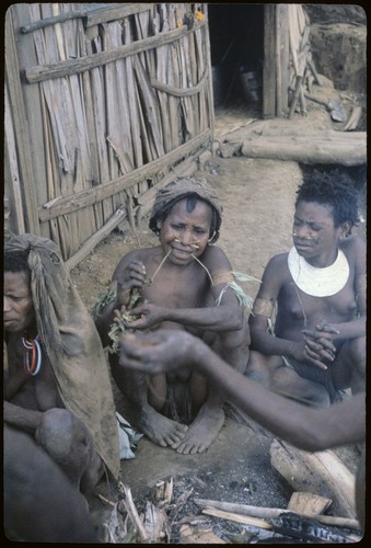 Food preparation: women sharing food