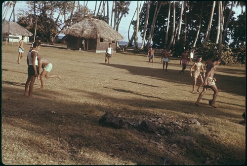 Boys playing soccer, Society Islands