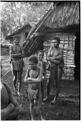 Babaimp: Kalam adolescent boy and children next to house