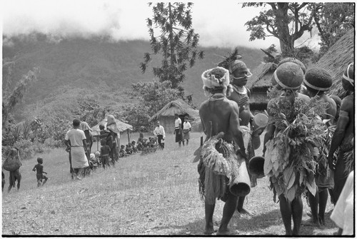 Church service in Tsembaga: men prepare to dance at service held by Solomon Islander Anglican missionaries