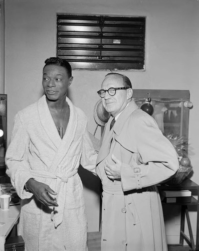 Photograph of Nat King Cole and Jack Benny