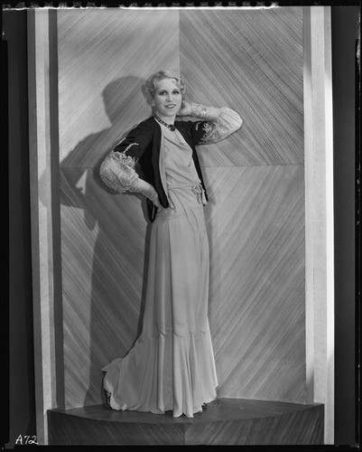 Peggy Hamilton modeling a gown with a matching jacket, circa 1931