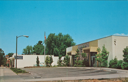 A postcard of Beaumont Ave, looking north, showing the US Post Office