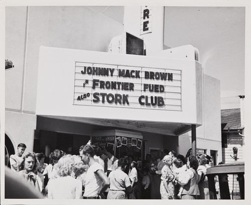 Photo of the Theater on the 400 block of East 6th Street during the 1947 Cherry Festival