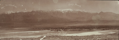 The town of Beaumont, CA, looking north. Snow topped Gray Back Mountains to right, and the San Bernardino Mountain range to the left