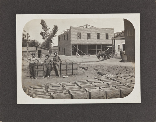 The A.T. Ganat Building, west side of street in 1907-1908 on Egan Ave