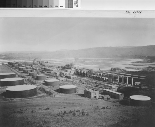 [Photograph of the Standard Oil Refinery]