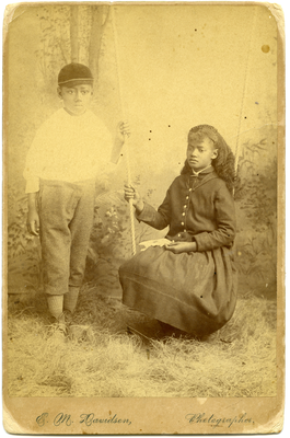 Portrait of unidentified boy and girl