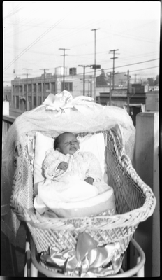 Gloria Pearl Roberts [?] in baby carriage