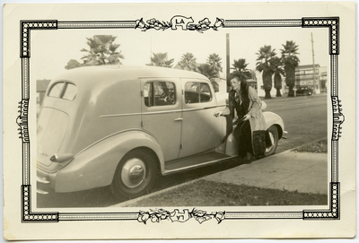 Unidentified woman getting into parked car