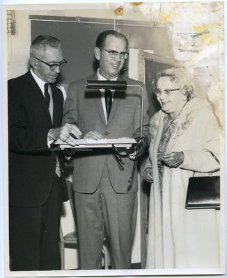 Supervisor Kenneth Hahn (middle), Pearl H. Roberts (left), and unidentified man (right)