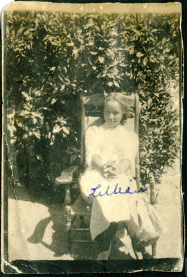 Lillian [-] sitting in rocking chair